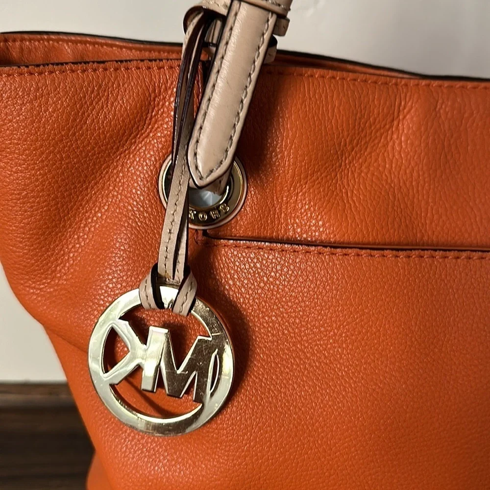 Michael Kors 2 pc Jet Set Orange Pebbled Leather Shoulder bag & wristlet wallet